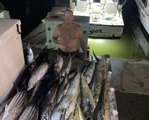 deep sea fishing, Oahu north shore. Hawaii sportfishing group display catch.