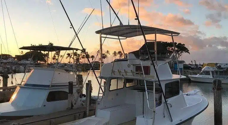 Flyer Oahu deep sea fishing boat docked at Haleiwa harbor after a day of providing sportfishing charters.
