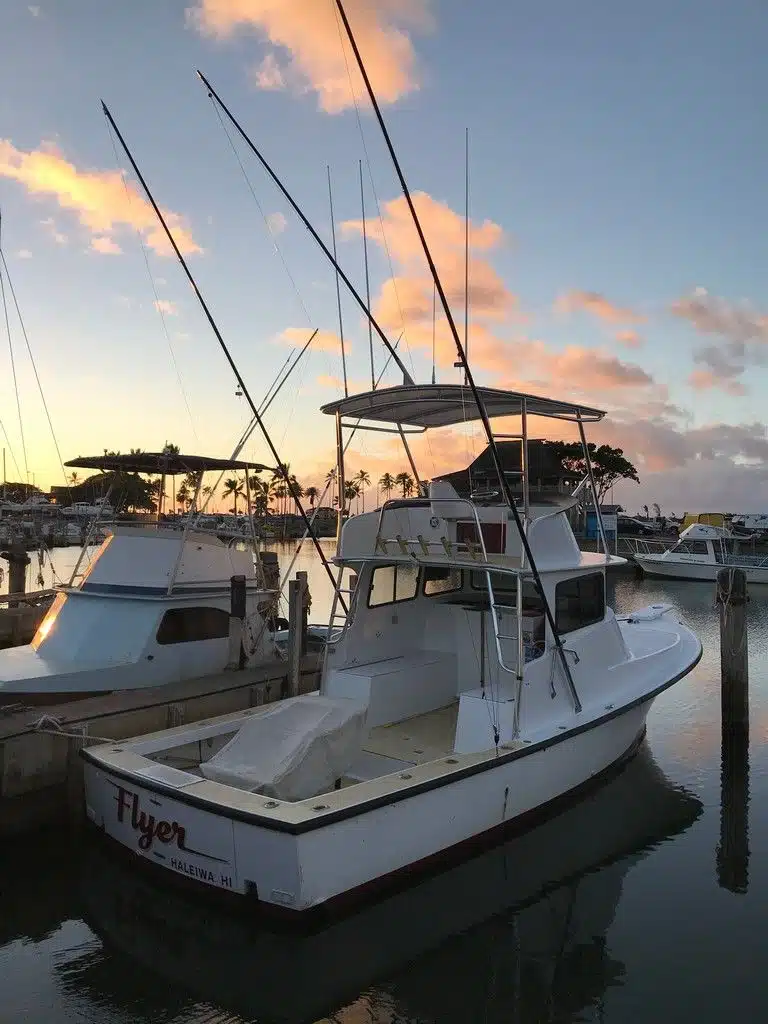 Flyer Oahu deep sea fishing boat docked at Haleiwa harbor after a day of providing sportfishing charters.