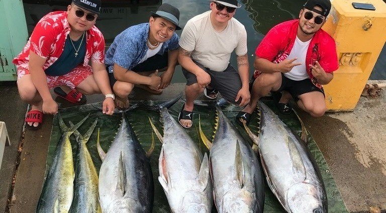 men catch fish Oahu