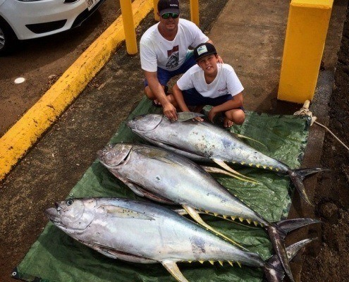 Ahi fishing tour at Haleiwa harbor. Yellowfin tuna catch displayed after private charter.